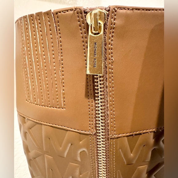 MICHAEL Michael Kors Brown Monogram Embossed Leather Tall Leather Boot - Picture 9 of 10